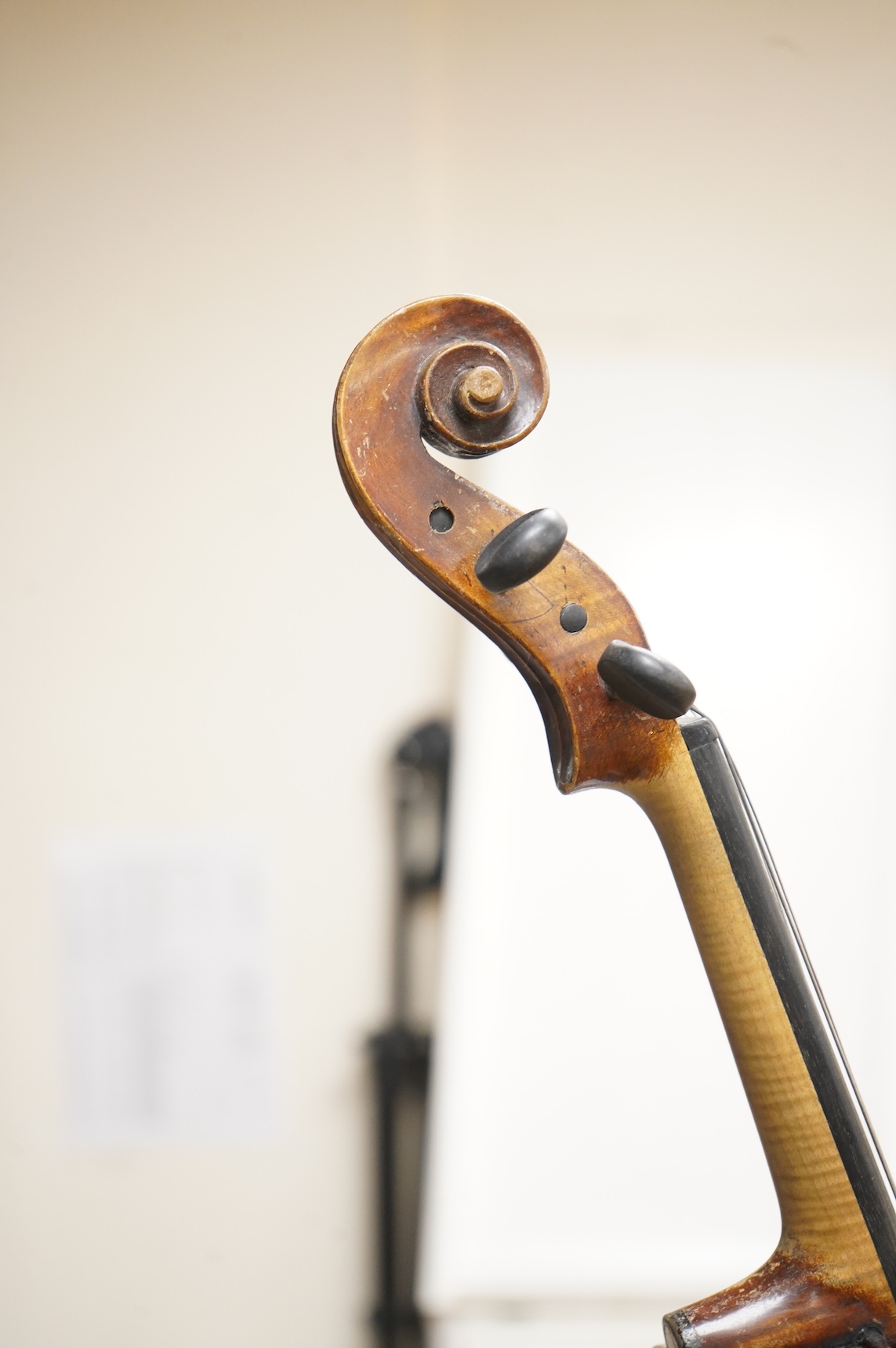 A cased late 19th century German viola, the body 15 3/4”, bearing a label reading Max Lutz 1939